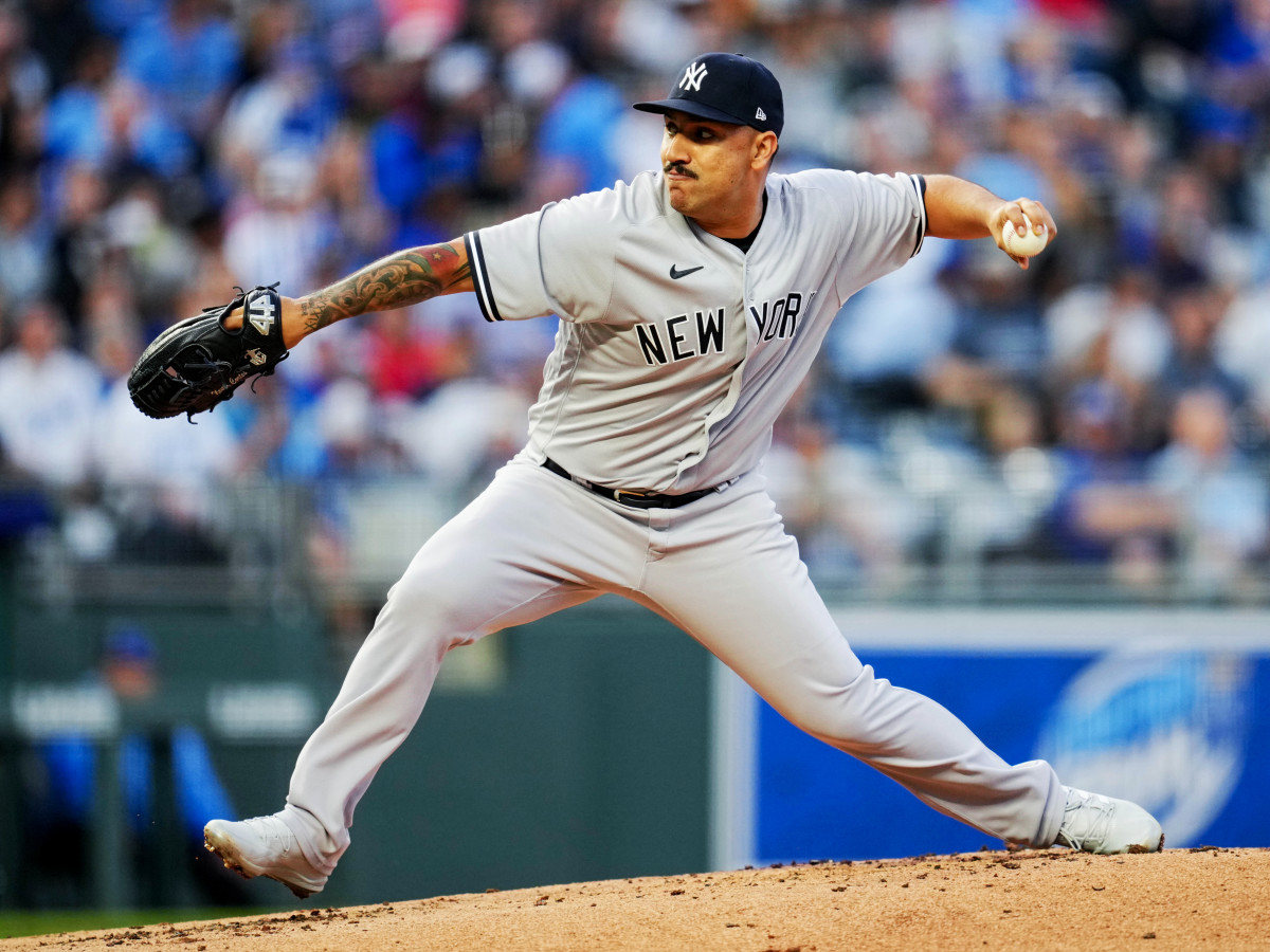 Apr 29, 2022; Kansas City, Missouri, USA; New York Yankees starting pitcher Nestor Cortes (65) throws against the Kansas City Royals during the first inning at Kauffman Stadium.